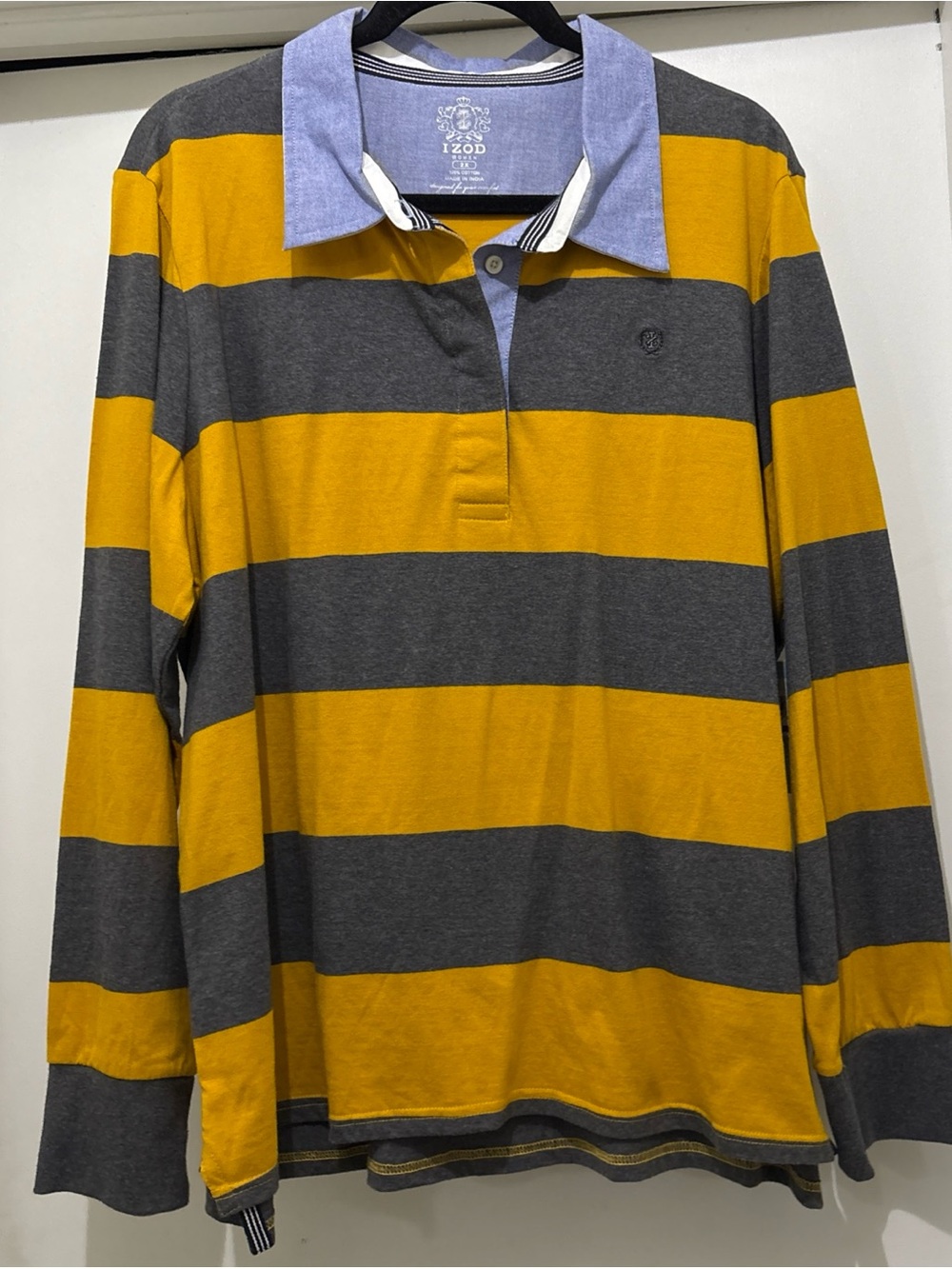 Izod women’s size 2X  gold and gray striped rugby shirt. New with tags